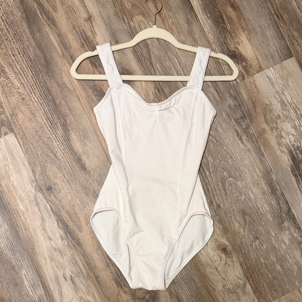 Women’s white Capezio leotard never worn size medium